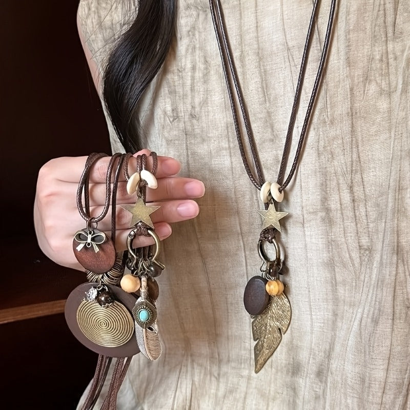 5-Piece Bohemian Layered Necklace Set for Women – Retro Boho Sweater Chain Y-Shaped Necklace with Feather, Leaf, Butterfly, and Star Pendants, Fashionable Stackable Jewelry Gift for Daily Wear and Banquets